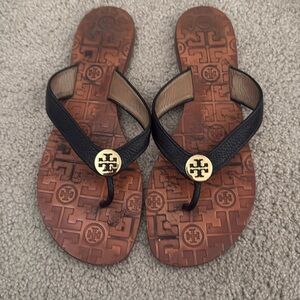 Black Tory Burch sandals with gold emblem size 9